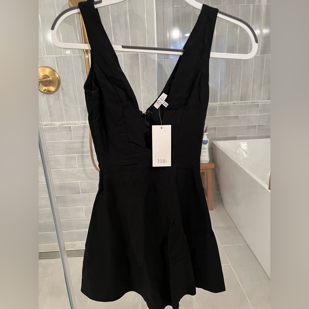 Black TOBI dress. New with tags. Size XS.